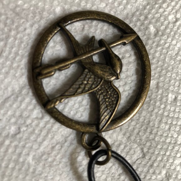 Lions Gate Films Hunger Games Mockingjay Brass Medallion pendant on Black Cord - Picture 2 of 5